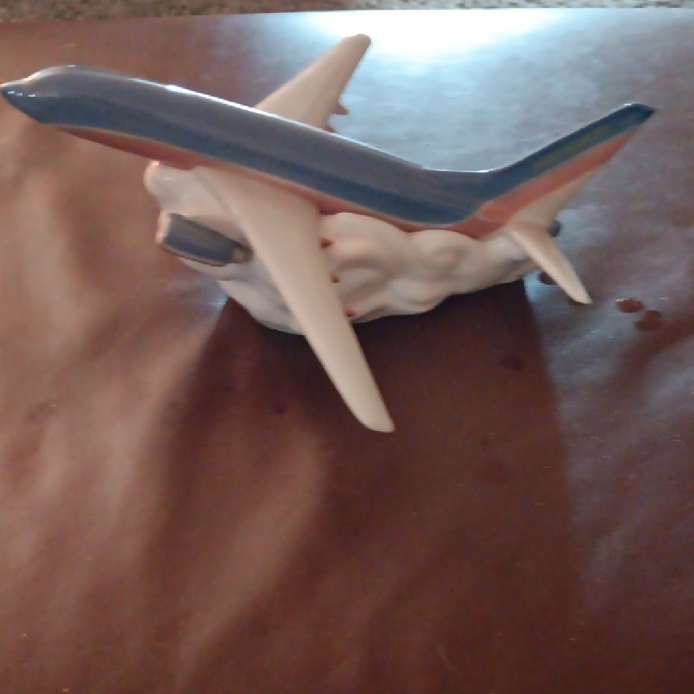 Elegant Blue and White Ceramic Airplane Figurine